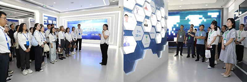 Les participants visitent le hall d'exposition de la Fuda